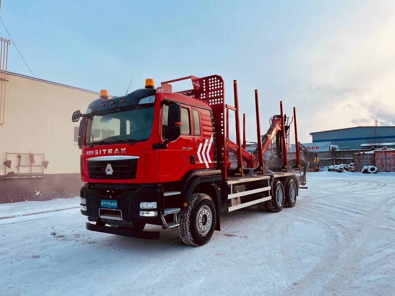 Лесовоз Sitrak C7H 6х4 с КМУ Велмаш ВМ10-86